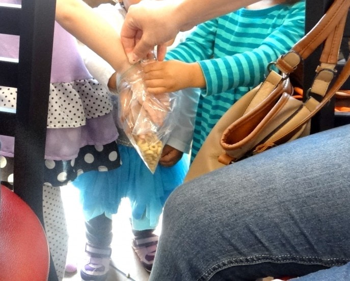 It never fails. Feed a little one a good meal and she will still reach for the cereal bag when it comes around!