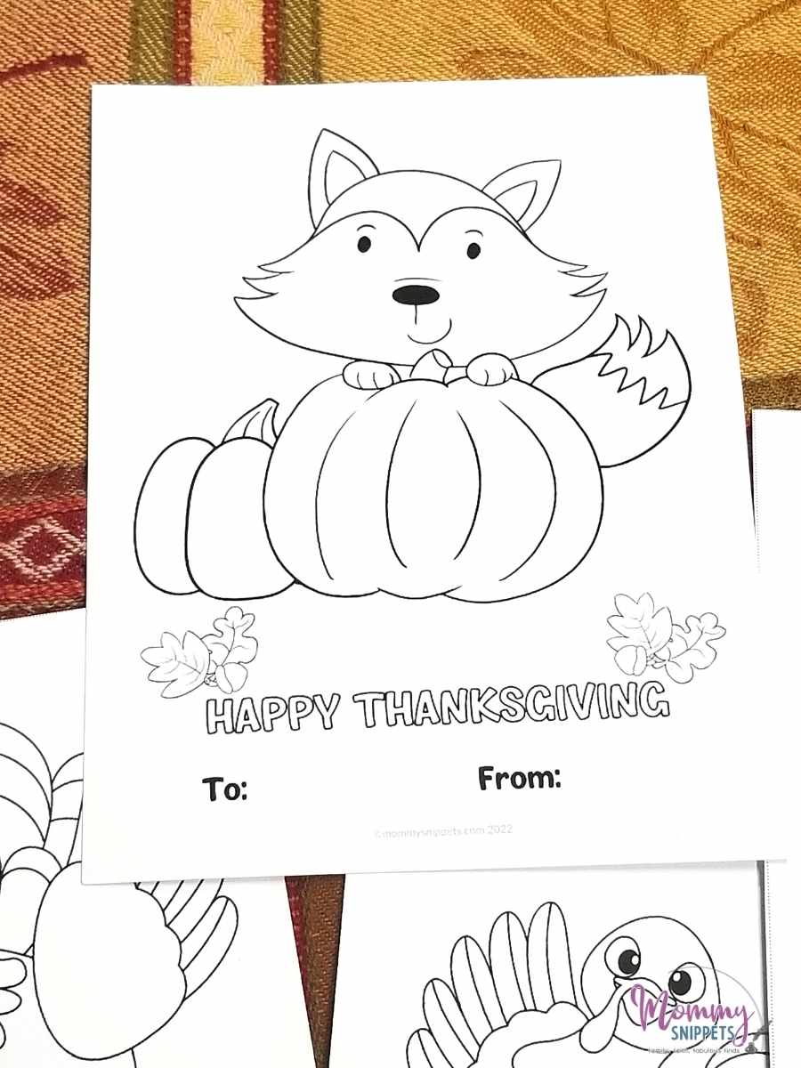 Thanksgiving coloring card with the illustration of a sweet fox behind a pumpkin