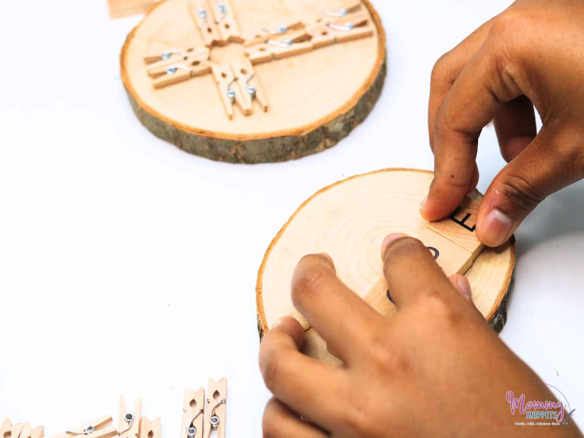 place letters to form the word hope on the Wooden Decor Piece- beautiful Cross Gift
