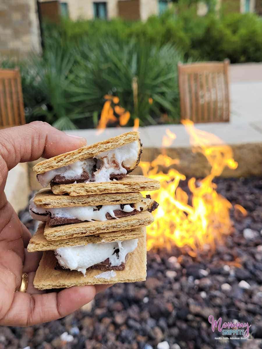 Making s'mores at African art around Kalahari Resorts-Round Rock 