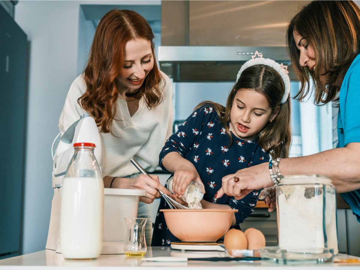 multi generational family cooking